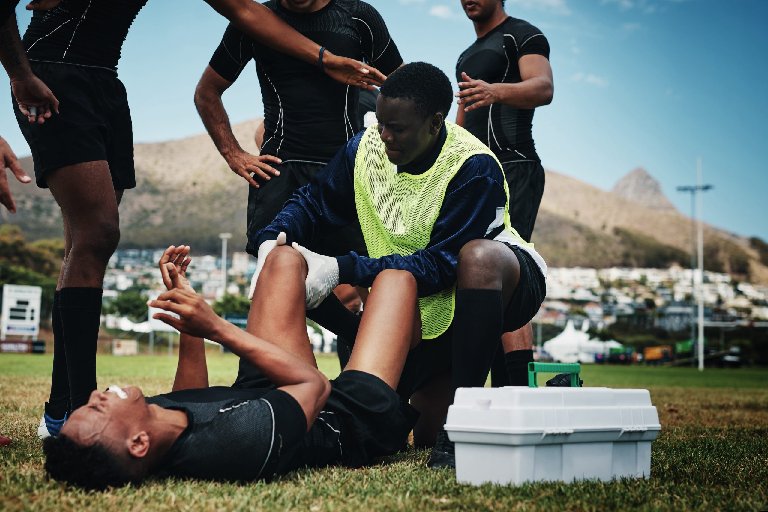 cropped-shot-of-a-young-rugby-player-receiving-orthopedic-care Sport Orthopecic care